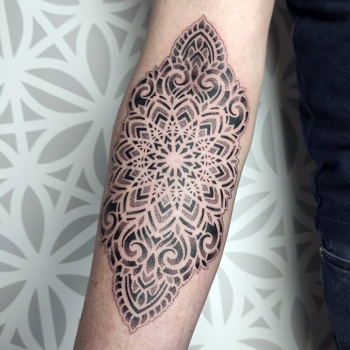 Vrouwelijke mandala tattoo