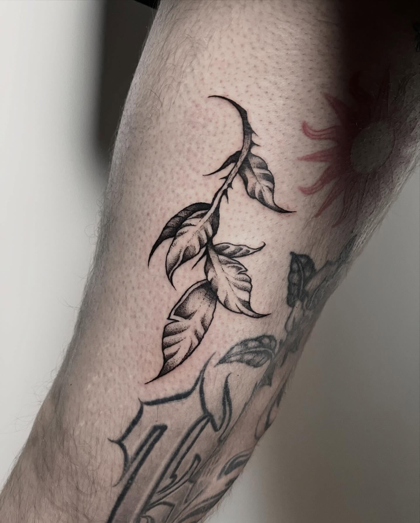 Spikey leaf tattoo